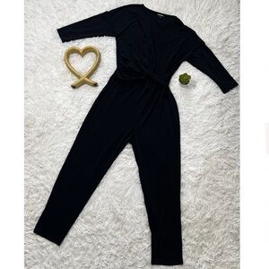 Express Black Jumpsuit with Fitted Silhouette and Minimalist Design